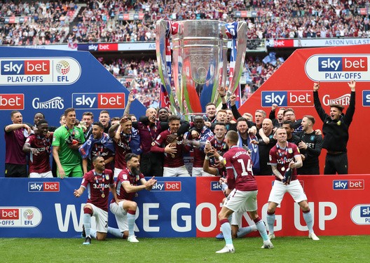 Villa celebrates promotion